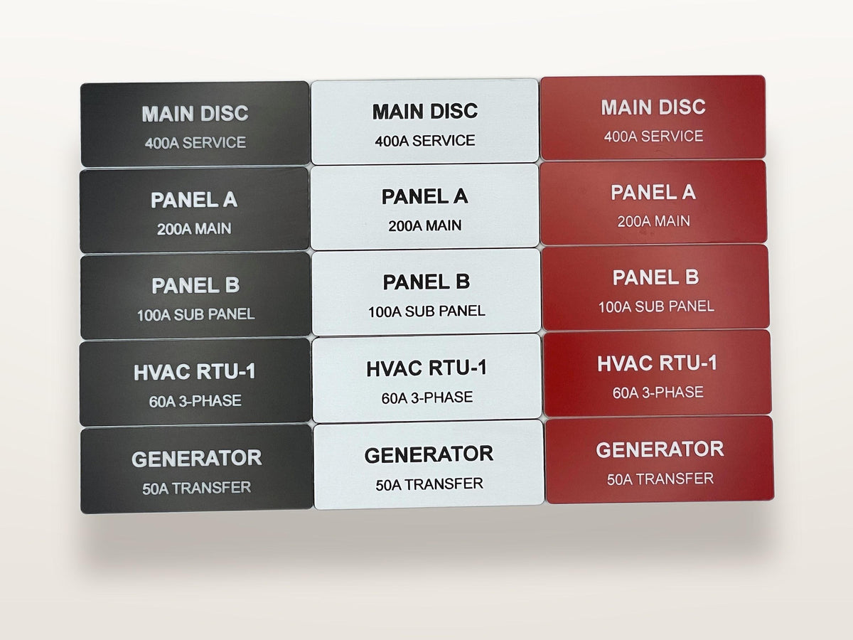 A grid of fifteen rectangular electrical panel labels arranged in three columns of black, white, and red. Each label features black or white text identifying circuits such as MAIN DISC 400A SERVICE, PANEL A 200A MAIN, PANEL B 100A SUB PANEL, HVAC RTU-1 60A 3-PHASE, and GENERATOR 50A TRANSFER.