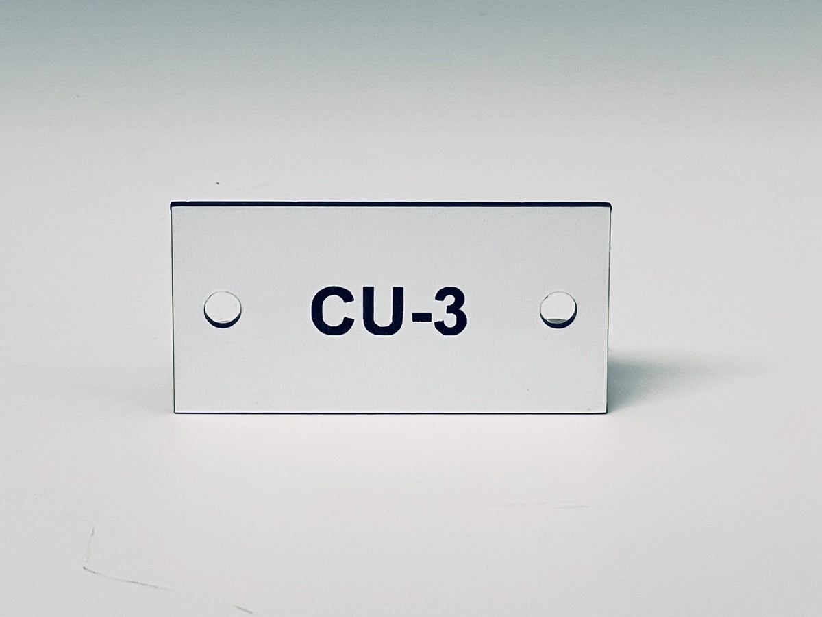 White engraved tag with two screw holes, black letters reading CU-3.